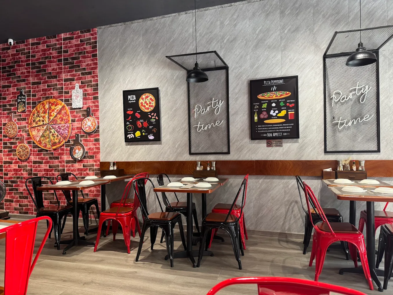 Modern minimalist dining space at Palm Pizza